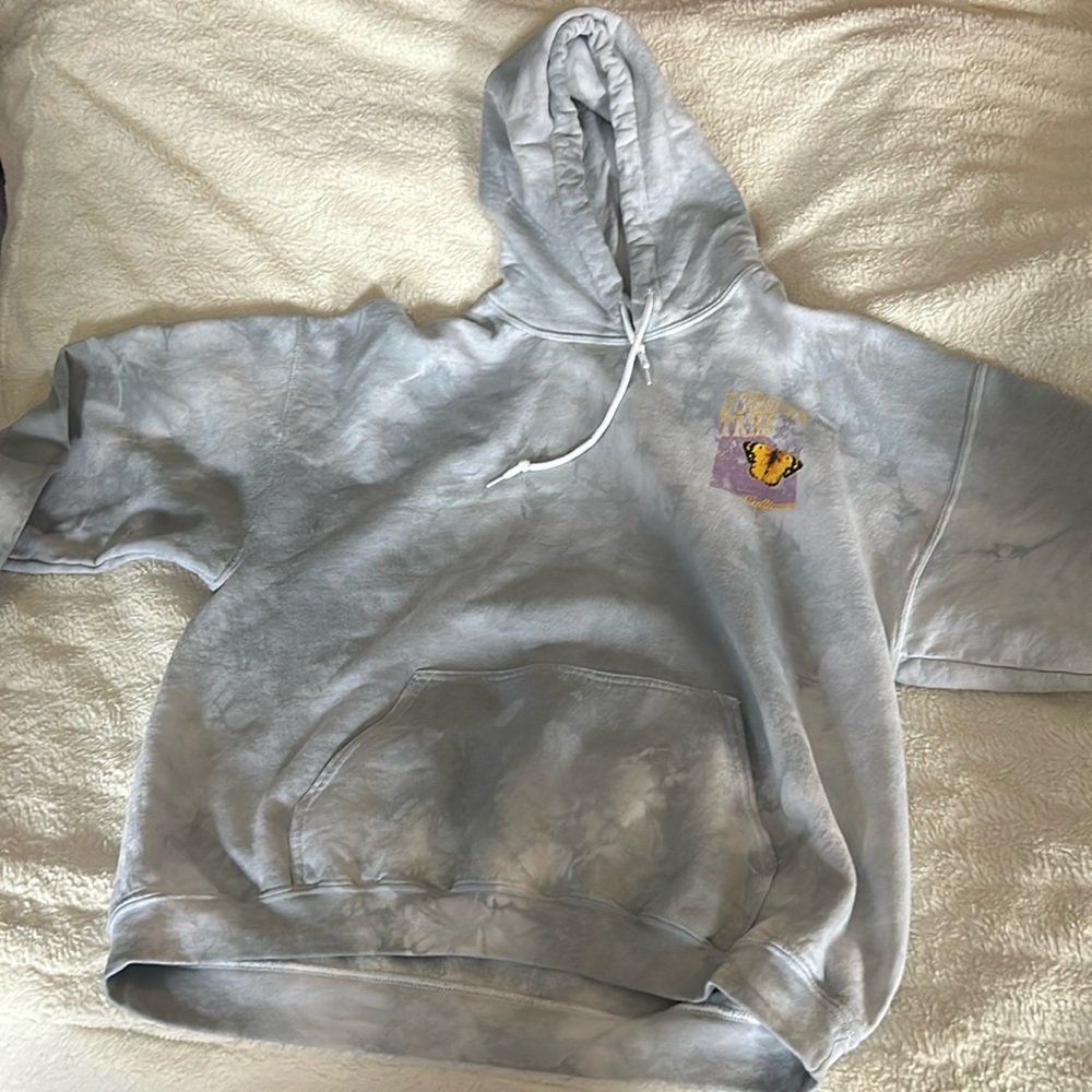 This sweatshirt is very soft inside. It has only be worn once.
